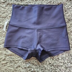 TNA Gloss cheeky 1.5 hi-rise shorts